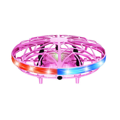 A pink hand-controlled UFO mini drone for girls, with spinning LED lights.