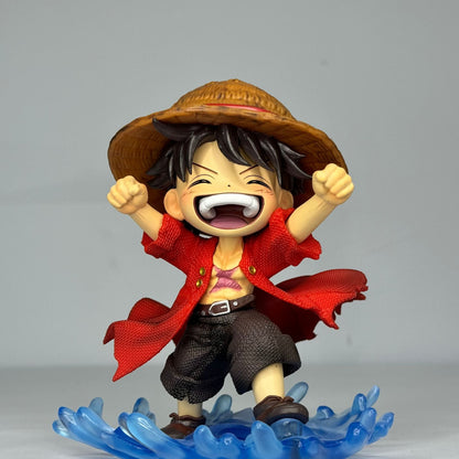 The One Piece Laughing Luffy figure displayed on a shelf to show its scale and how it looks in a collection.