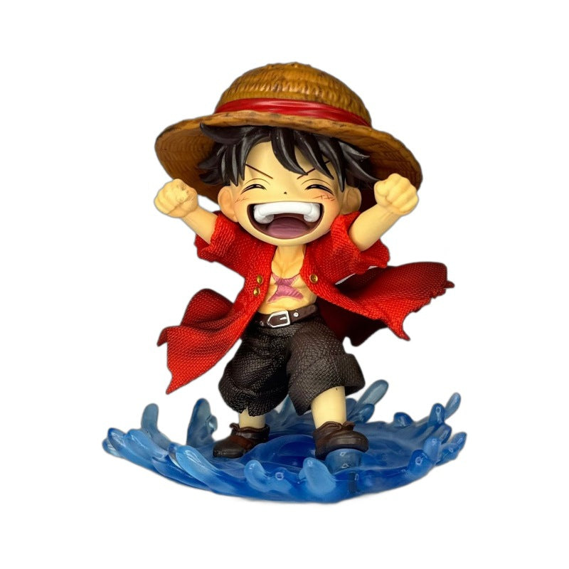 Front view of the One Piece "Water Moon" Laughing Luffy figure, showing his joyful expression and artistic base.
